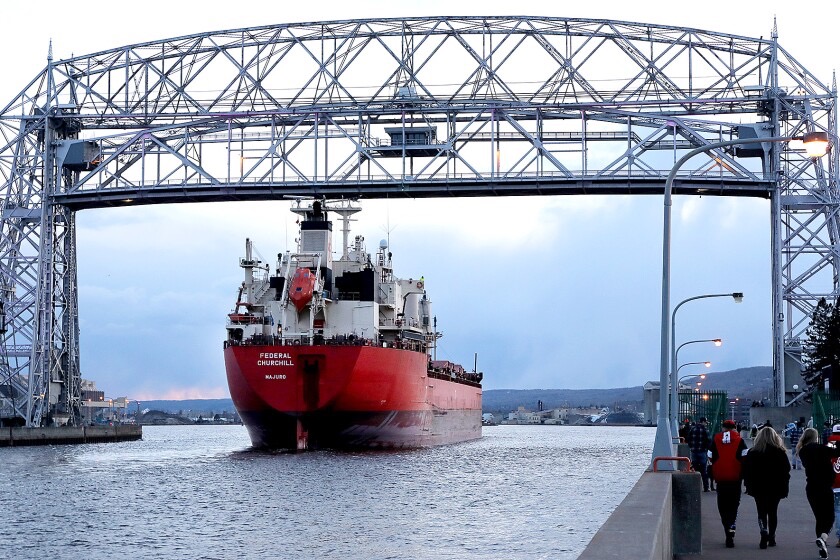 Cargo ship in port, rear view